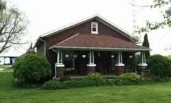 Country Charm! Quaint country home with 3 bedrooms and 1 full bath. Lovely original wood work. Eat in kitchen, living room, and den. Partial basment. Appliances, water tank and gates are negotiable. Large 40 x 60 barn and 18 x 18 garage. Great location