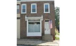 Work at Home! Great opportunity for a mixed use property. This property is a 4 bedroom, 1 1/2 bath twin home with a store front. Many possibilities for use! Professional office, retail space, nail salon, Barber Shop and more. Located with high visibility