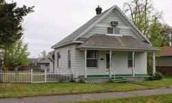 Darling bungalow located on a quiet, friendly street. Very well maintained with newer paint, siding and carpet. New vinyl windows and a skylight in the upstiars bedroom (could be 2 bedrooms). Very light and bright. Good sized kitchen with dining and
