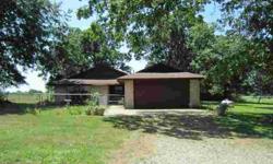You'll love this brick home surrounded by Lake Eufaula beautiful state parks! Home features 3 bedrooms, 2 baths, 2 car garage...all on over 1/2 acre lot. Living room offers cozy hearth. Kitchen appliances included. Sliding doors open to patio. Spacious