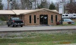 $92,000. Brick commercial building located on Hwy 304. Previously used as a bank business office, this building is perfect retail space or great rental potential. Presented by Gary Venice, Broker/Owner, REALTOR(R) call/text (423) 508-5025 or (click to