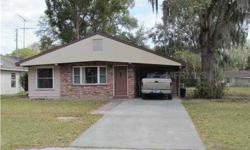 Nice Home, Nice Lot, Nice Pool! Love the outdoors and want lots of space? This is the home for you. Three bedroom, one and half baths, 1080 SF of living space. New carpet, roof is just over one year old, a wonderful Florida room that could double as a