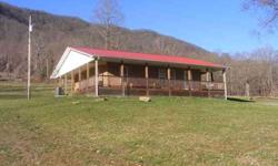 #2485 - Jonesville, VA - Tucked in the foot hills of the mountains is this adorable home sitting on over an acre of land and a mountain back drop that is breath taking. Great views from this wrap around porch; feel the mountain breeze and drink the