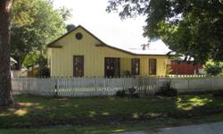 1930's Home in Historic Downtown Smithville. 3 Bedroom's on Large Corner Lot. Complete with Pickett fence,Pecan Trees, Two of the Largest Pine Trees downtown Smithville, Garden Area in Super Nice well supported Neighborhood. Smithville offers small town