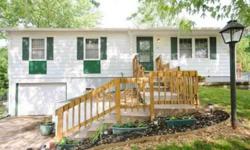 This adorable raised ranch home features 4 bedrooms and 1 and 1/2 baths and is situated on a long lot with mature trees in Kansas City's Lee Ann subdivision. Attention to detail can be found around every corner - from the freshly painted walls to the