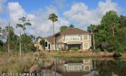 This beautiful Marsh Landing home was built by Elwood Collier & features hardwood floors in the main living areas & gorgeous natural water views. Gracious formal living & dining rooms lead to the large kitchen which has cherry cabinets, granite counters