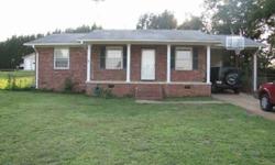 3 bed/ 1.5 bath traditional home with columns on the front porch. With a few cosmetic touches home could be a warm and cozy home with fenced in back yard. Convenient location. Carport has storage room.
Listing originally posted at http