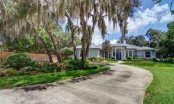 Located in the heart of Sarasota, this expansive, private & perfectly maintained family home is sure to delight as you pass through the stately gated entrance. The neighborhood is less than 1 mile from the popular Tamiami Trail, convenient for shopping &