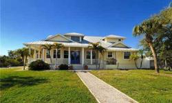 Enjoy living on beautiful Siesta Key in this newer, 2-story home.This four bedroom treasure features formal living and dining rooms, eat-in kitchen, volume ceilings and a balcony overlooking the pool. Live the Florida lifestyle, have the convenience of