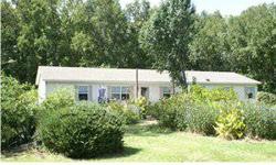 Enjoy the peace and quiet out in the country. Like new home spacious home boast 4 bed rooms, 2 full baths on 4.8 Acres (home on +/- 2.0 acres, balance of property wooded),, plenty of room for a garden, livestock and your boat! This is a Quiet area with