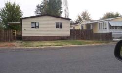 NICELY UPDATED 4 BED, 2 BATH DOUBLE-WIDE MANUFACTURED HOME IN UNION GAP. LARGE LOT WOULD BE PERFECT FOR LARGE SHOP, THIS PROPERTY IS NOT IN THE FLOOD ZONE. VAULTED CEILINGS, NEW KITCHEN CABINETS, HIGH EFFICIENCY HEAT PUMP WITH PELLET STOVE. 1981 GIBRALTER