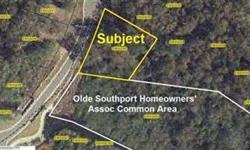 Opportunity knocks with this beautiful homesite located in the heart of Southport. Width of property will allow for many options when building. Right side of homesite borders creek ensuring privacy. Neighborhood is very convenient to shopping, dining and