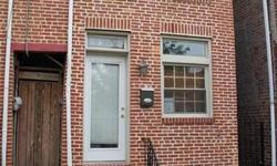 Charming brick front home on a quaint street! Exposed brick walls, updated throughout, ceramic tile kitchen and baths, recessed lighting, stainless steel appliances, skylights and much more! You will love being in walking distance to great entertainment,