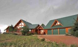 True Colorado Rocky Mountain log home living in gated community on 35 acres of privacy, pines, meadows, rock formations & breathtaking mountain views in every direction. Rustic, warm & inviting with open great room floor plan, huge log beams, interior log