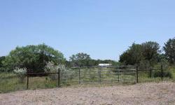 Enjoy relaxing scenery with this quiet wooded 5.17 acre lot on the corner of The Hills Road and Hills Way in the gated subdivision of The Hills. This lot already has a 4 stall horse stable with tack room ready to lodge your horses. This property has