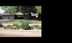 This is a lovely three bedrooom, two bath, two car garage home. It is located in an established neighborhood with mature trees and great landscaping. The living area has vaulted ceilings with a remote controled retractable skylight blinds. The kitchen and