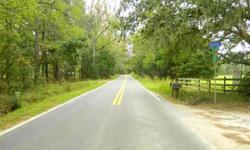 Build the house of your dreams on this peaceful "high and dry" lot. Canopy Oak stretch of road decorate your scenic view as you approach this stunning lot. Wide lot allows generous liberty when designing your custom plan. Environment gives your the