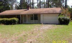 HOUSE IS BEING SOLD AS IS - House is clean and can be occupied without any repairs. Garage area is constructed of Hardy Board and exterior wall needs repair. Dishwasher does not work. Florida room has sliding glass doors on three sides. Will make a great