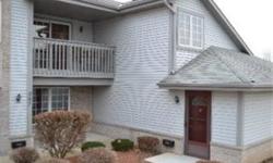 Great location overlooking conservancy just minutes from Pewaukee Lake! This upper unit has been freshly painted in neutral colors, is super clean & ready for you to move in. Open concept layout offers kitchen with breakfast bar, dining room, great room