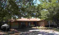 woodburning fireplace, formal dining room, large screened porch, attached garage, large trees, water fountains, storage building, fenced backyard. Call Williams Ranch Properties 254-442-1880 for more information or appointment to see.Listing originally