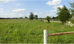 Sandy loam pasture fenced on 3 sides. Part of larger ranch being offered for sale. Electric, telephone, water available at the road, will need septic. Site built homes only. Paved access. Popular area for horse lovers. Minutes from Smithville.Listing