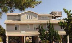 Oceanblock beach home just 3 lots off the Ocean with lots of character and appeal. Enjoy the Ocean views and sounds from the multiple decks and porches. Impressive rental history exceeds $53,000 per year. Listing agent and office