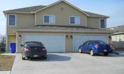 This is a very nice 3 bedroom, 2.5 bath duplex with double car garage. You may purchase one or both sides. There are nine other single duplexes available at the same price. MUCH less expensive to own than to rent. Close to Fort Riley. Another fine