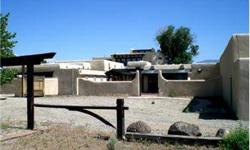 Extraordinary Investor/Developer opportunity to own the former RC Gorman Estate, a Taos landmark... and complete your own design/build to suit. Guesthouse is remodeled, 2012. Main home is gutted and ready to complete... containing original architectural