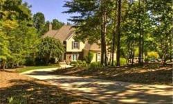Private Lakefront Country French Style home on nearly 1.5 wooded acres near the end of a cul-de-sac with private pier. With 4 bedrooms and 4 1/2 baths and private pier, this expansive home is a must see. It is located in the prestegious and private
