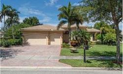 Gorgeous 4 bedroom 4 bath home in premier gated community offers beautiful lake views along with marble floors, gourmet kitchen, crown molding, luxurious master suite with sitting area and spa bath, lush tropical landscaping, beautiful covered patio, with
