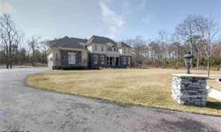 This amazing property offers 5 spacious bedrooms with 4.5 baths. Situated on a wooded acre of land the amenities go on and on, including a gourmet kitchen with Dacor 6 burner stove, Viking Beverage refridgerator, 48" Sub Zero Refridgerator/Freezer, Miele