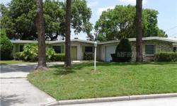 Short Sale. Canal Frontage with access to Clear Lake, enjoy beautiful views of downtown Orlando's skyline from your boat. Family room has large brick-covered, wood burning fireplace. Lovely views of canal from Master bedroom and Family room. Now is the