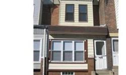 (Call Nicholas Sylvestro at 215-400-2605 to see this and other homes today!)Charming House for sale in Fishtown. 2 bedrooms, 1 large bath, large living room with fireplace, hardwood floors throughout, just painted, enclosed porch at front of house (could