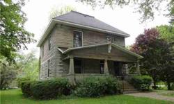 REDUCED and QUALIFIES FOR 100% FINANCING! Historic Bedford Stone Four Square, located in an area of charming cottage homes. Entrance foyer still has original light fixture, and other fixtures in bsmt. Home features original woodwork, hardwood floors,