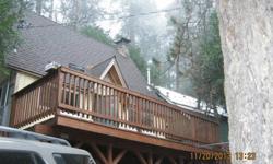 Large cabin, close to town. Eat in kitchen, new roof, plumbing and water heater