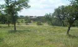 Hill top lot overlooking 7 acre park with ponds & hike and bike trails. Beautiful long distant panoramic views. Gated community with 24 hour guard house. Arnold Palmer 18 hole golf course. Clubhouse with dining & dramatic views of Lake Travis and the hill
