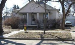 Really Nice 2 bedroom bungalow. Re-modeled in 2006. Beautiful original woodwork, berber carpet, nice kitchen with dishwasher, refrigerator and range included, central heat and air. Enclosed side porch, partial finished basement for laundry room and
