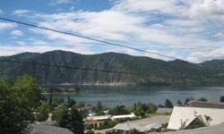 Lake Chelan view lot located at Manson. Easy access off paved road with gravel driveway and close to everything