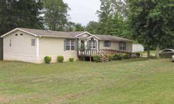 VERY NICE MANUFACTURED HOME ON 8+/- ACRES IN SMITH COUNTY WITH KILGORE ADDRESS IN CHAPEL HILL ISD. LARGE MASTER W/HIS & HERS BATHS, LARGE WALK-IN CLOSETS, AND SITTING AREA. NICE KITCHEN WITH LARGE PANTRY, ISLAND, AND AMPLE STORAGE. WATCH THE DEER FROM THE