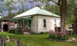 Here is affordable retirement like you've never seen before. A quaint 118 year old home in good condition with several outbuildings for storage and shop space plus a barn for just $99,500. 4 acres of trees and pasture, dead end county road, walk to the