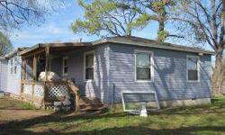 LISTING REALTOR RELATIVE TO THE SELLER.HOME IS REALLY NICE. UPDATED FLOORS WITH WOOD VINYL,INSIDE UTILITY, GARDEN DOORS, GARAGE CONVERTED TO MASTER/BR. HAS BARN FOR COWS, CHICKEN HOUSE. LARGE PINE AND OAK TREES. REALLY CLEAN. LIVING ROOM ENLARGEMENT AND