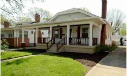 What a charmer! Very few homes have this much character in Speedway. Amazing front porch and portico for your car. Living room greets you with cozy fireplace & huge crown molding. Dining rm will steal your heart w/ original leaded glass built ins!