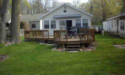 Come check out this year round home or weekend cottage that is move in ready. Features include wrap around deck and appliances stay. Located on Round lake which connects to Big Cedar Lake for skiing. This one won't last long so call today for your