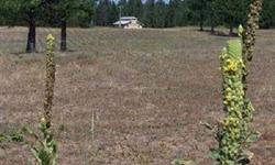 Unbelievable views of Fertile Valley from this 11 plus acre parcel with barn, well septic and power. Ready for your custom built home or move in a single wide and use the already installed tie downs. Located less than an hour from Spokane. Call today for