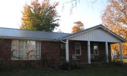 Metal building is perfect for storing your Recreational vehicle and much more!!! Brick home has 3 bd and 2 full baths. All kitchen appliances are staying. Fireplace in family room/kitchen has a woodburning insert. 2 level acres with fruit trees, grape