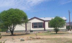 Lovely four BD two BATHROOMs manufactured home on 2.5 acres. New well. Spectacular views and a huge 24'x48' 4 bay steel shop.
Nancy Welch has this 4 bedrooms / 2 bathroom property available at 1477 N Broken Lane in Willcox, AZ for $99900.00. Please call