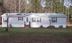 Nice 3 Bedroom, 2.5 Bath Homewith Fireplace Has a Beautiful Landscaped Yard, New Makeovers Inside & Out and all Ready to Move in. Priced to Sell Quick!!. Located on a Quiet Country Road so Watch out for the Deer & other Wildlife while driving.