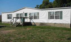 This double wide is 1705 sq ft, with 3 bedrooms and 2 baths. Split floor plan, whirlpool tub in master bath, large lot 1.96 acres, tons of privacy, backs up to woods. New back deck.Listing originally posted at http