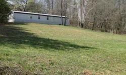 Nice singlewide on beautiful property with no restrictions! Very nice on the inside with new carpet and vinyl flooring. All appliances convey. An awesome 30X40 steel building/workshop with seperate power. Also has a large old barn, and old home that could