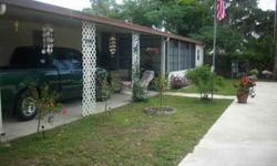 Excellent mobile home in a 55+ park south of Winterhaven off Old 17. 14'X52', two bedroom/2 bath, open floor plan, beautiful sun room level with mobile. Air and heat thru all. Carpet and linoleum. Most rooms have been painted. No leaks, gorgeous